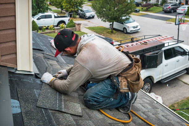 Professional Roof Replacement technician working in Fredonia, WI
